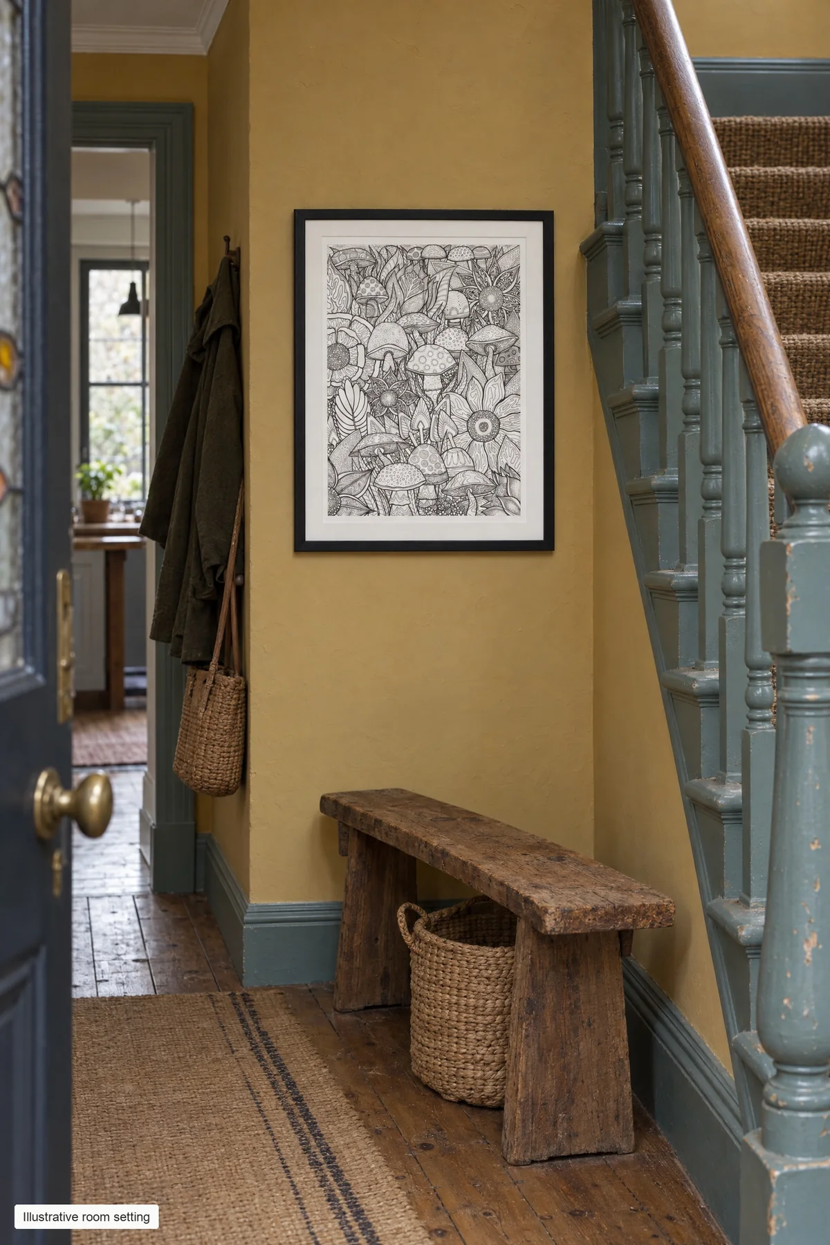 Intricate black and white botanical drawing in a black frame above a wooden bench, beside blue stairs and a mustard hallway wall